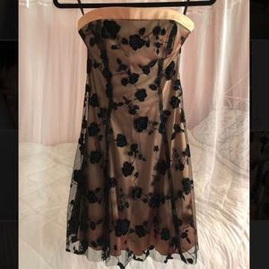Golden dress with black floral lace design